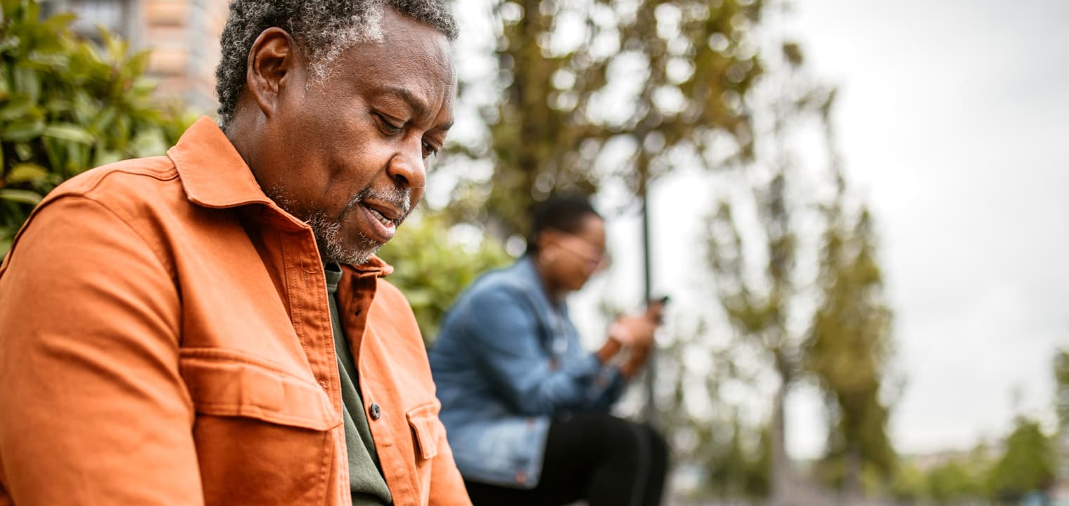 Stock photo of a African American man in his mid-50’s outdoor on a walk.