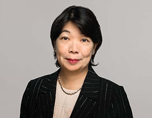 Photograph of Yumi Sato, Chief Development Officer.