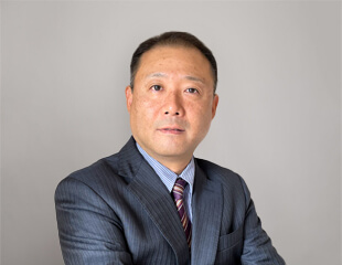 Photograph of Koji Ishida, Vice President, Head of Global Finance, Sumitomo Pharma.